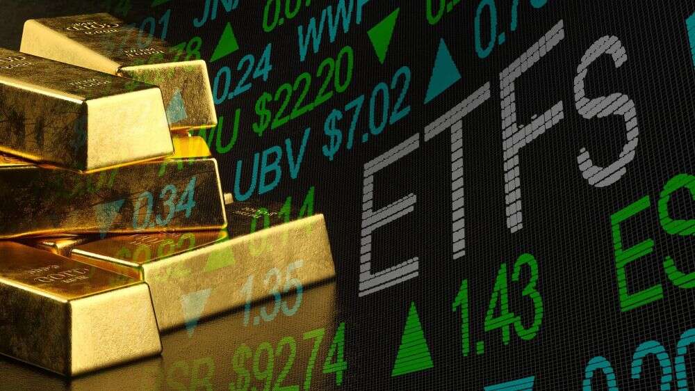 چند شمش طلا با نمودار سهام و ETF