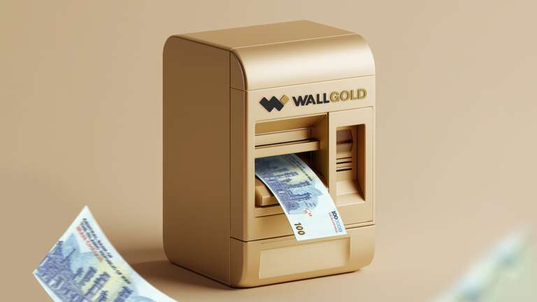 دستگاه خودپرداز با لوگوی وال گلد و چند اسکناس در کنار آن